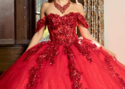 Red off-the-shoulder quinceañera ball gown at Hem & Her Bridal in Tucson, AZ