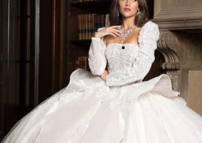Ivory strapless quinceañera ball gown at Hem & Her Bridal in Tucson, AZ